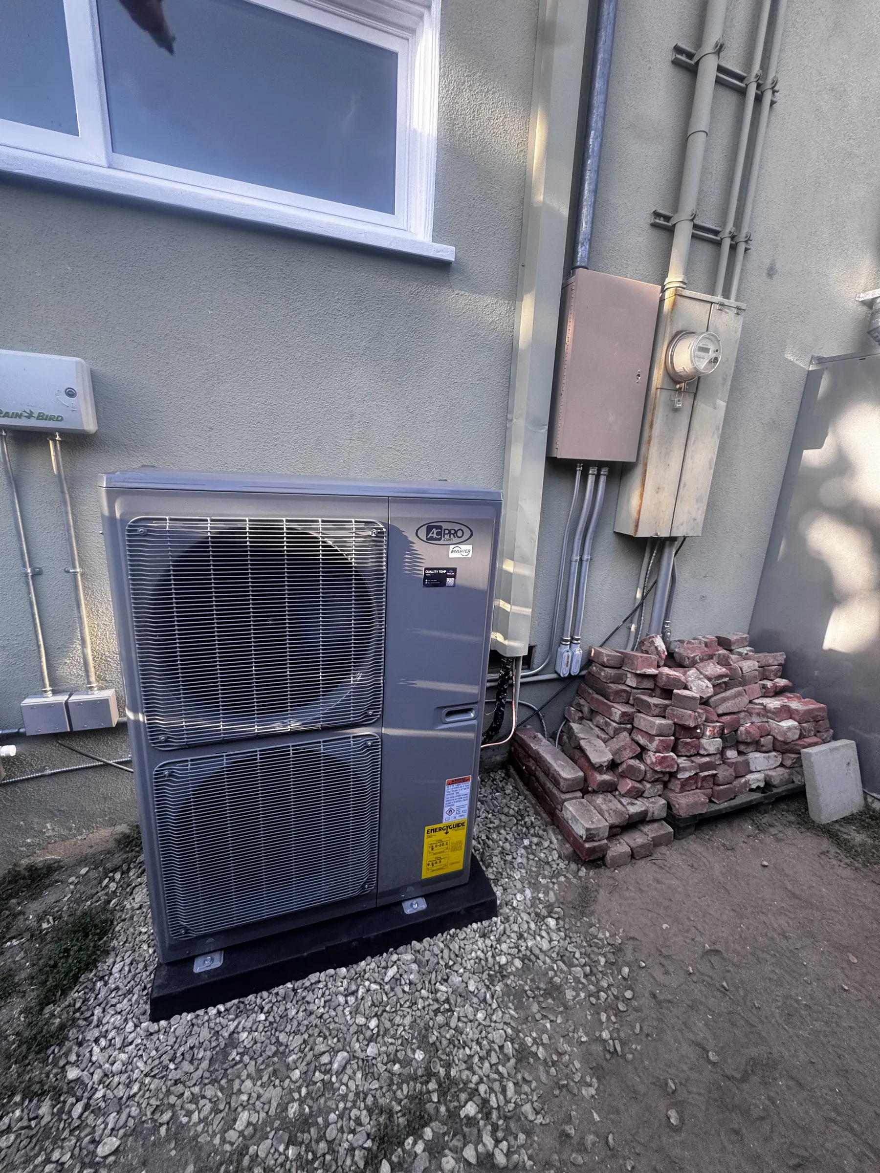 Outdoor HVAC equipment photographed at a Quality Temp jobsite